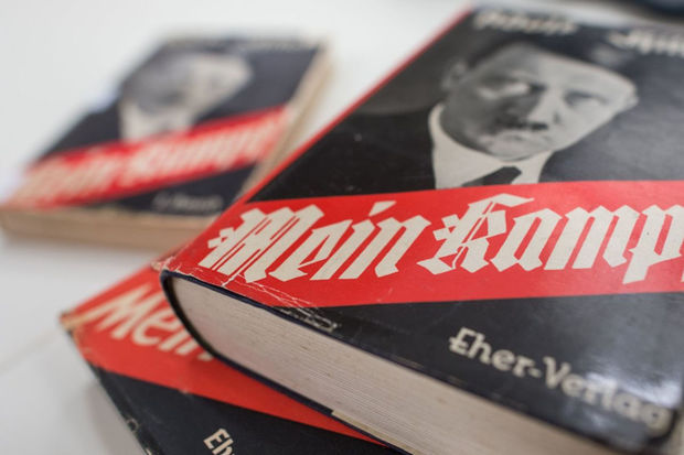 meshur-sirket-mein-kampf-kitabini-silmekden-imtina-etdiyine-gore-cerimelenib